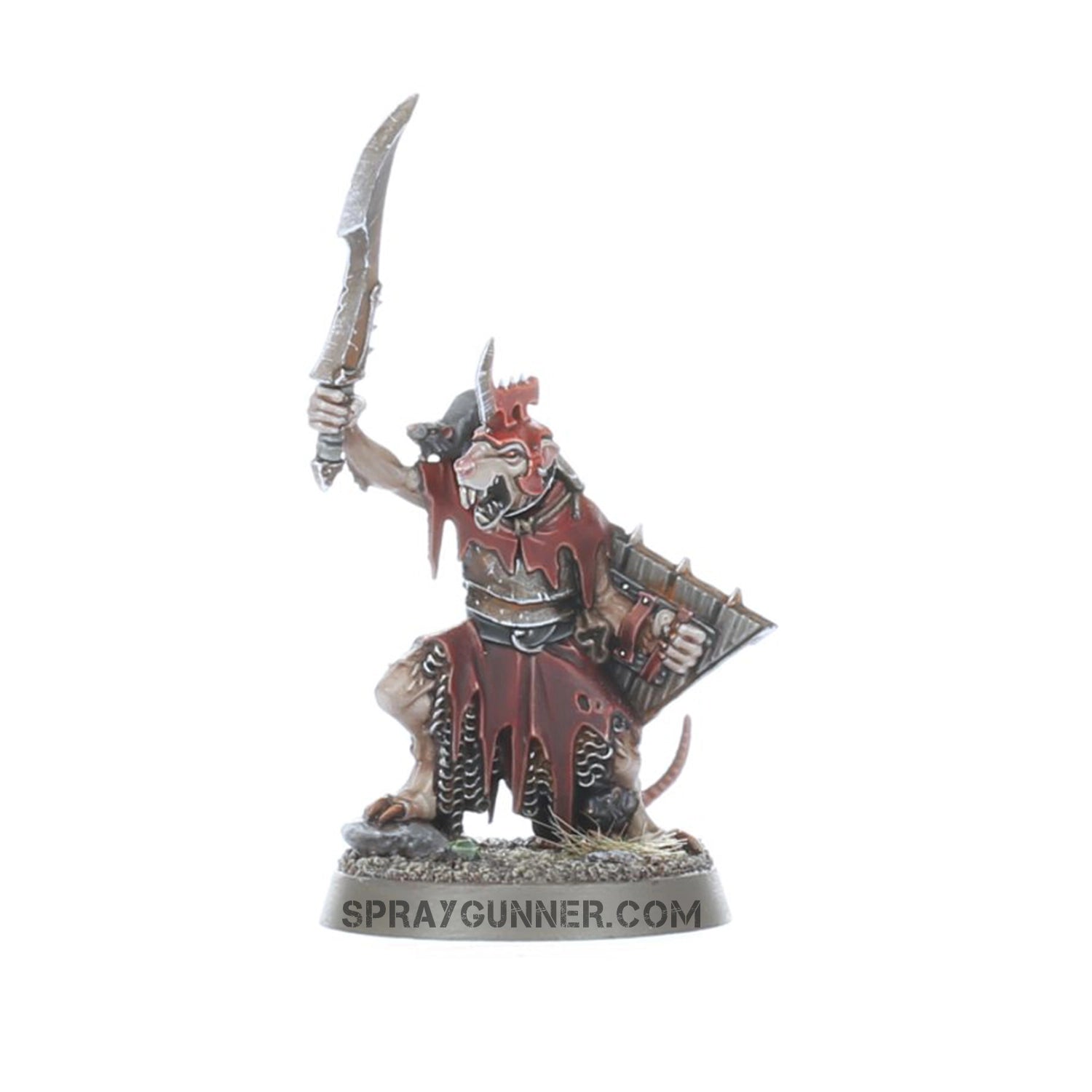 This miniature from Warhammer Skaven features a heavily armed rat-like creature with complex armor, numerous spinning cannons, and a dynamic pose on a textured base.