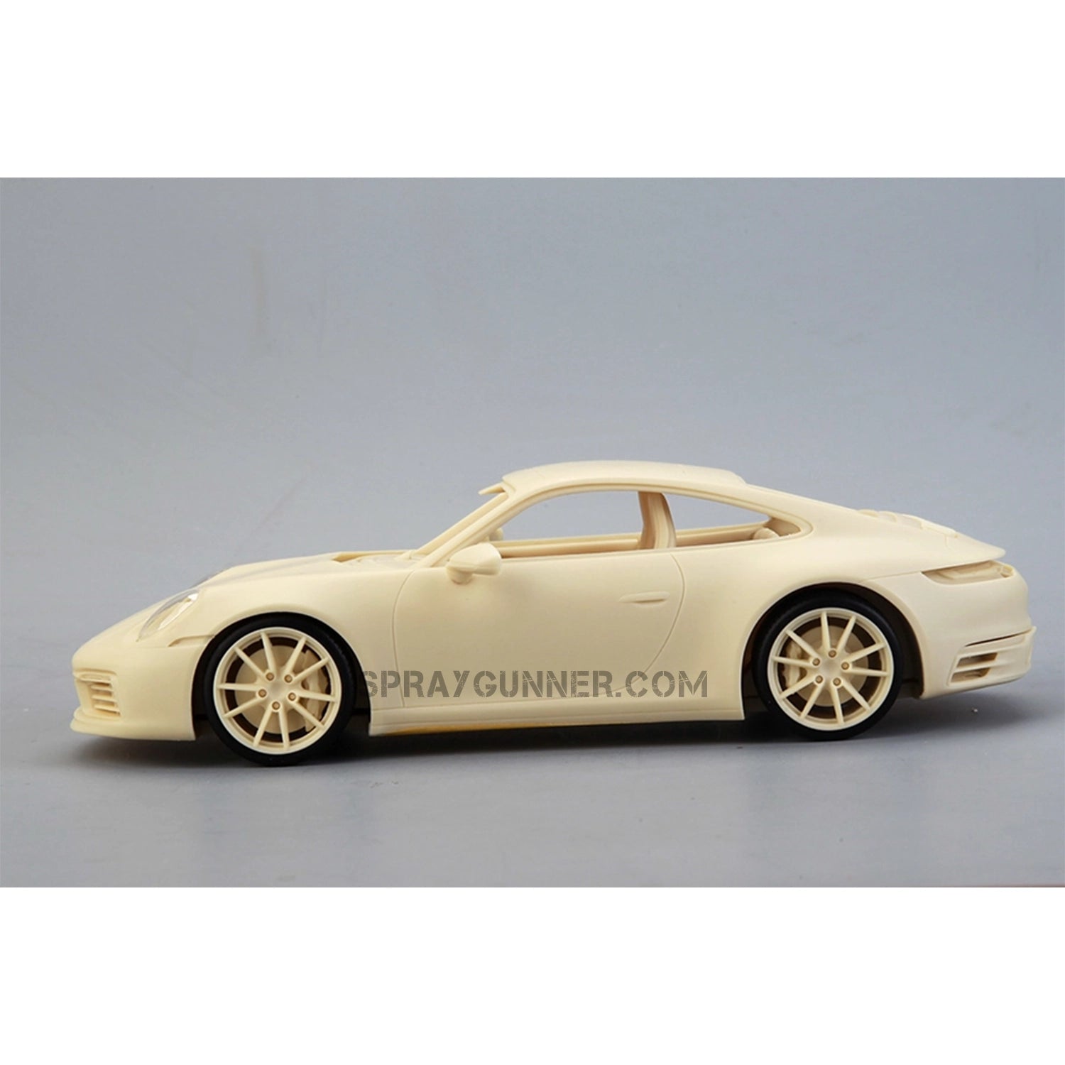 An intricate red and gold-rimmed copy of the Porsche 911 Carrera 2021 is included in the ALPHA MODEL 1/24 scale model automobile kit. Ideal for aficionados of model cars.