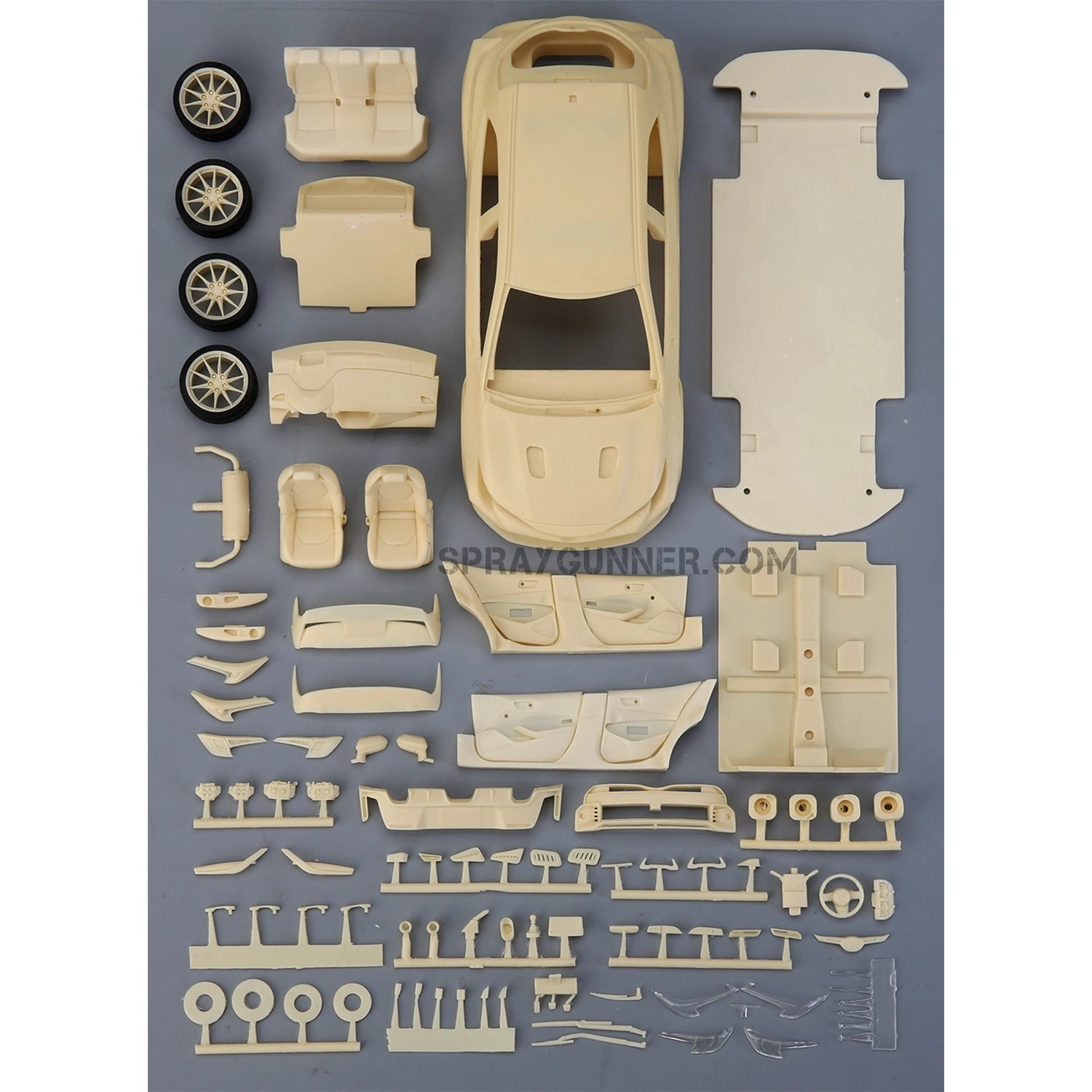 ALPHA MODEL: SprayGunner's 1/24 scale model car kit for Toyota GR COROLLA. Car fans and hobbyists will love this intricate scale model kit.