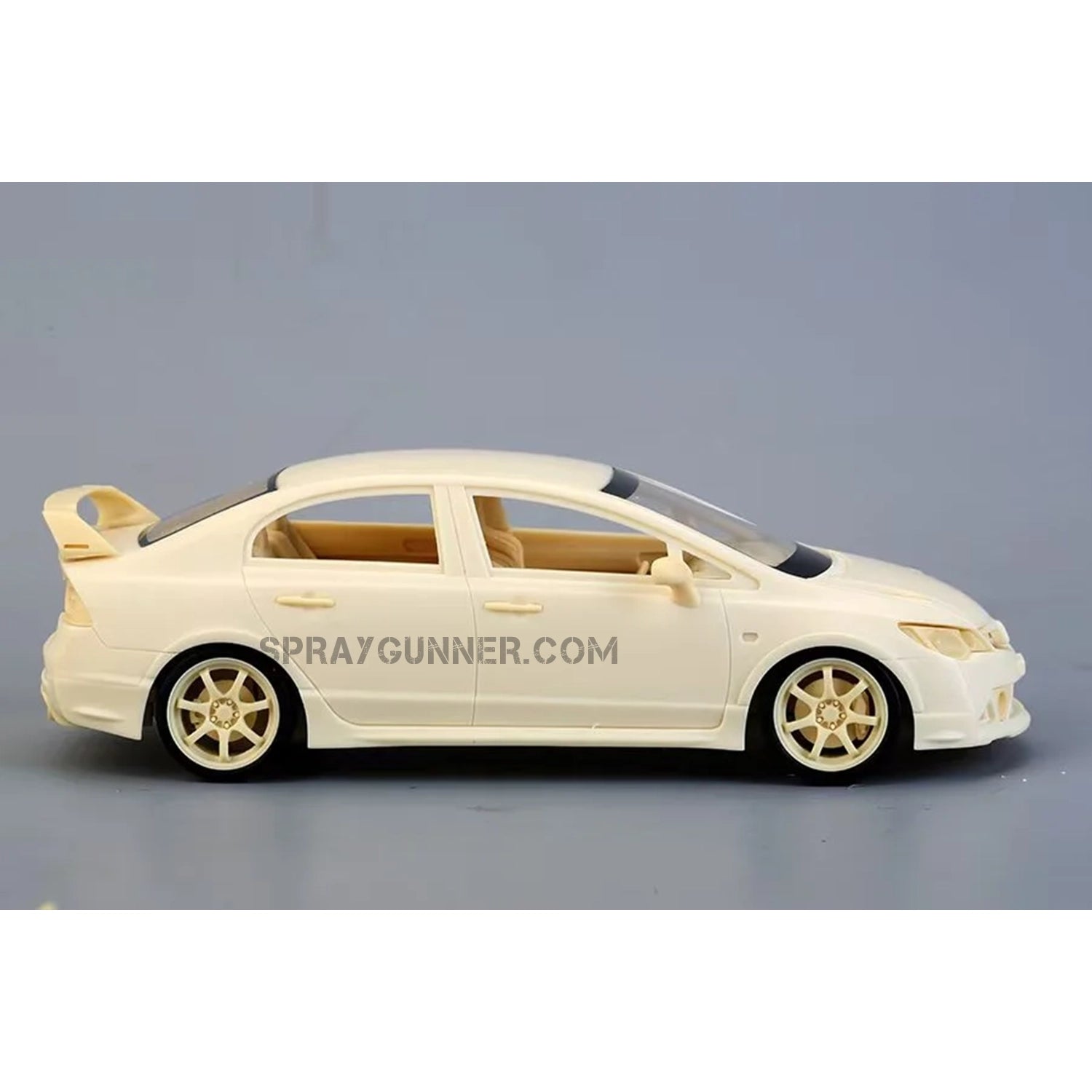 An extremely detailed red sports sedan with aerodynamic improvements is featured in the ALPHA MODEL 1/24 scale model kit of the Honda Civic Type (FD2) Mugen RR.