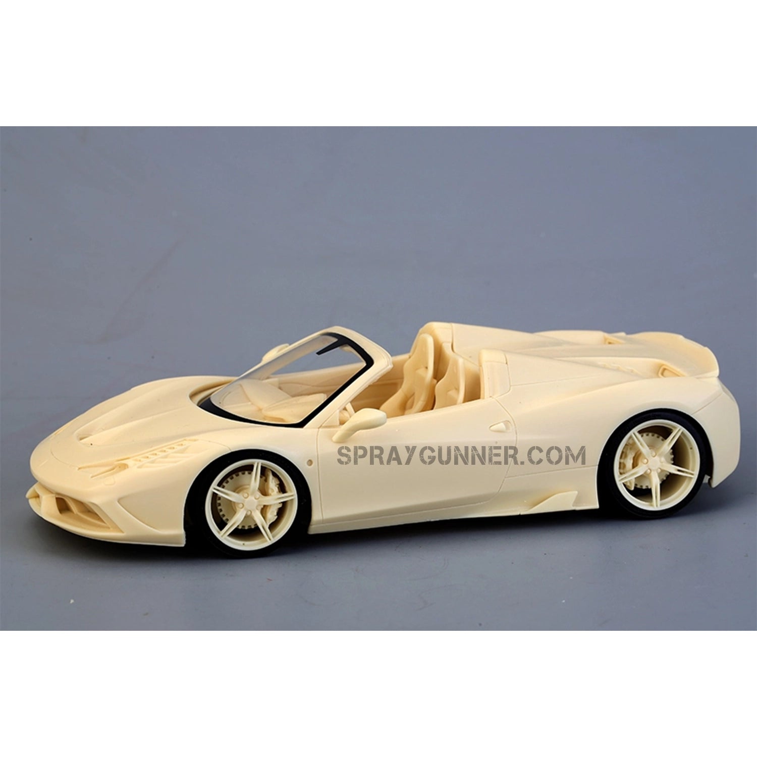 Side view of the ALPHA MODEL 1/24 scale model Ferrari 458 Speciale A in raw resin, highlighting intricate design and convertible structure.