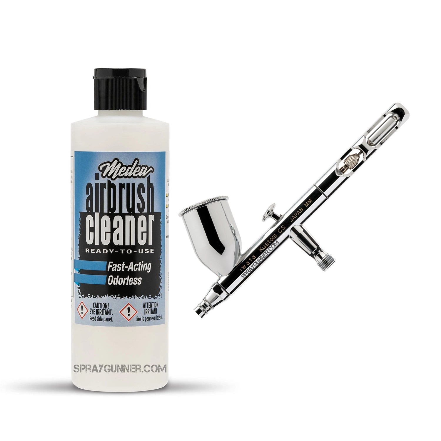The chrome-bodied, nozzle-equipped IWATA VAULT KUSTOM CS Gravity Feed Dual Action Airbrush is seen in front of a branded packaging box.