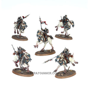 Five intricate Citadel miniatures of cavalry troopers on horses are included in the Warhammer 40K: Astra Militarum Death Riders scale model kit, which is perfect for tabletop gaming.