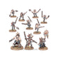 Detailed view of World Eaters Jakhals miniatures from Warhammer 40k Combat Patrol set, featuring brutal melee weapons and dynamic poses.