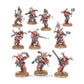 Close-up of World Eaters Khorne Berzerkers miniatures from Warhammer 40k Combat Patrol set, painted in red and black armor.