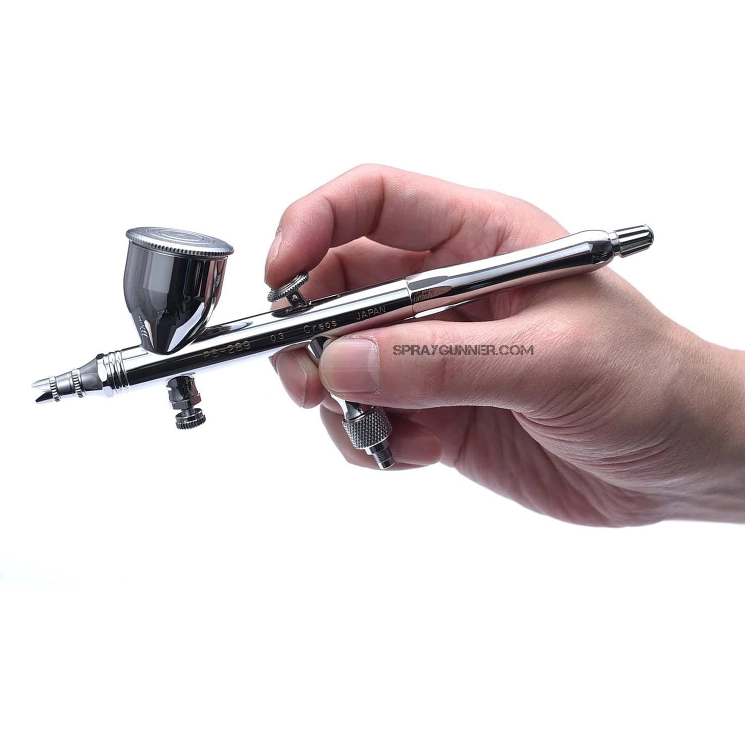 The 0.3mm Platinum airbrush with a sleek chrome finish, the GSI Creos Mr. Airbrush Procon Boy PS-289, comes in its original box. Ideal for precision painting and cosplay projects.