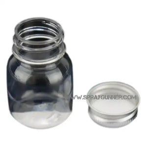 Plastic bottle with lid and label 1 oz