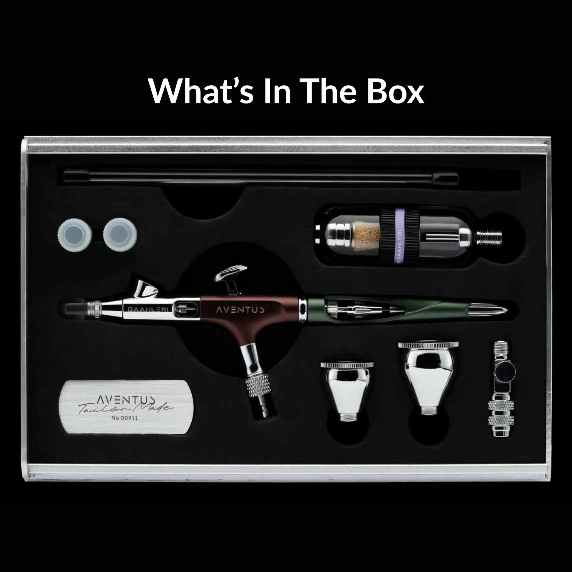 Gaahleri Aventus Tailor Made Edition airbrush kit showing the airbrush, aluminum case, moisture trap, quick-release adapter, collector’s badge, and included accessories.