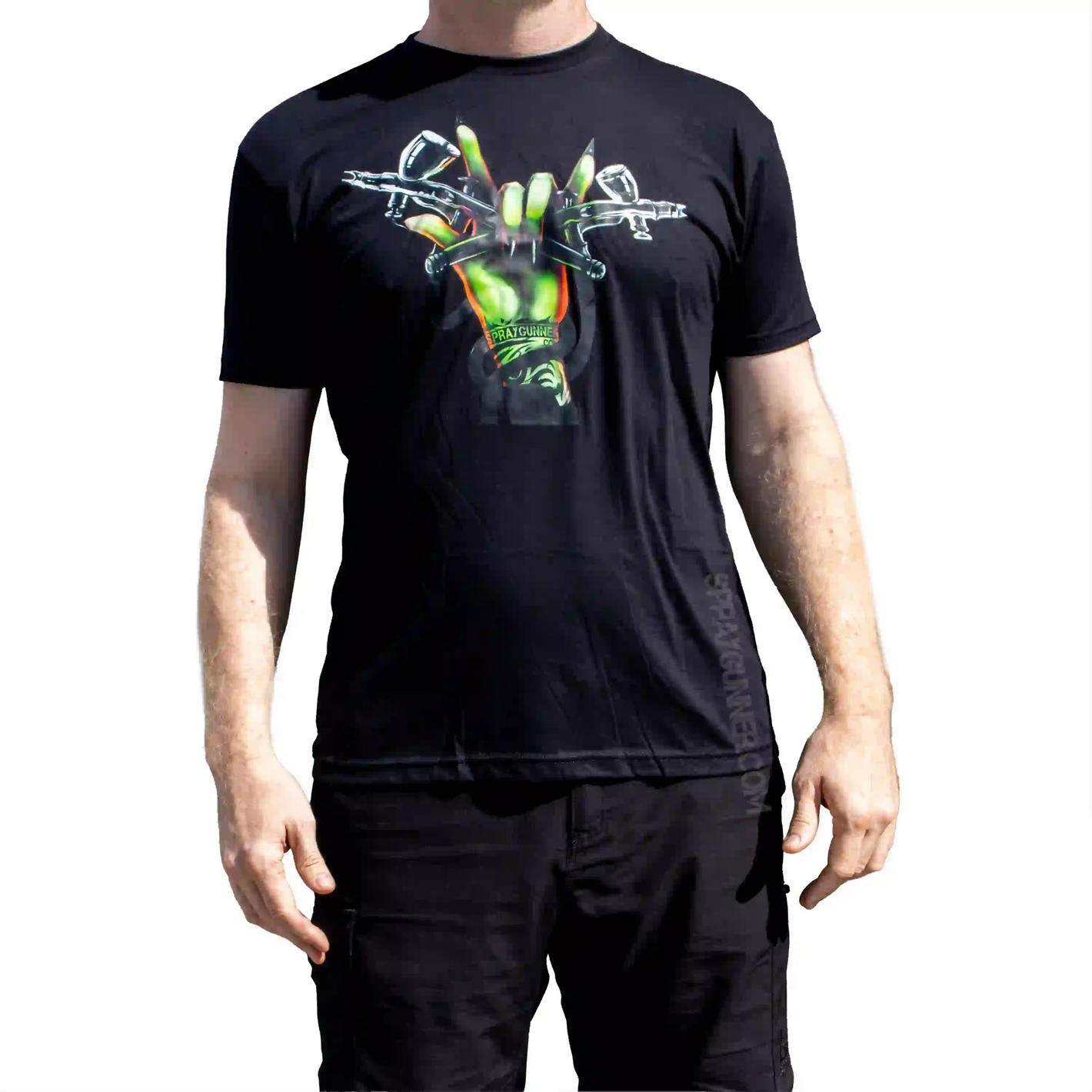 Exclusive Monster Airbrush T-Shirt featuring a green monster hand gripping dual airbrushes on the front. Perfect for airbrush culture fans.