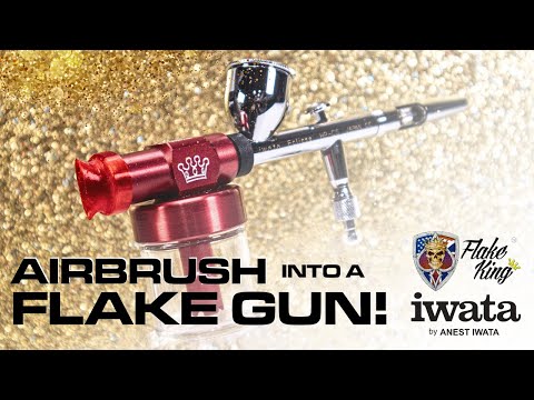 Iwata Eclipse HP-CS airbrush equipped with a Flake King 500 attachment for spraying dry metal flake in custom paint jobs.